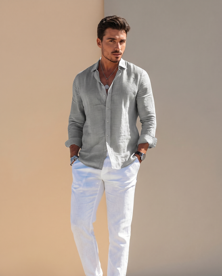 Riviera summer shirt styled with linen trousers on a neutral backdrop