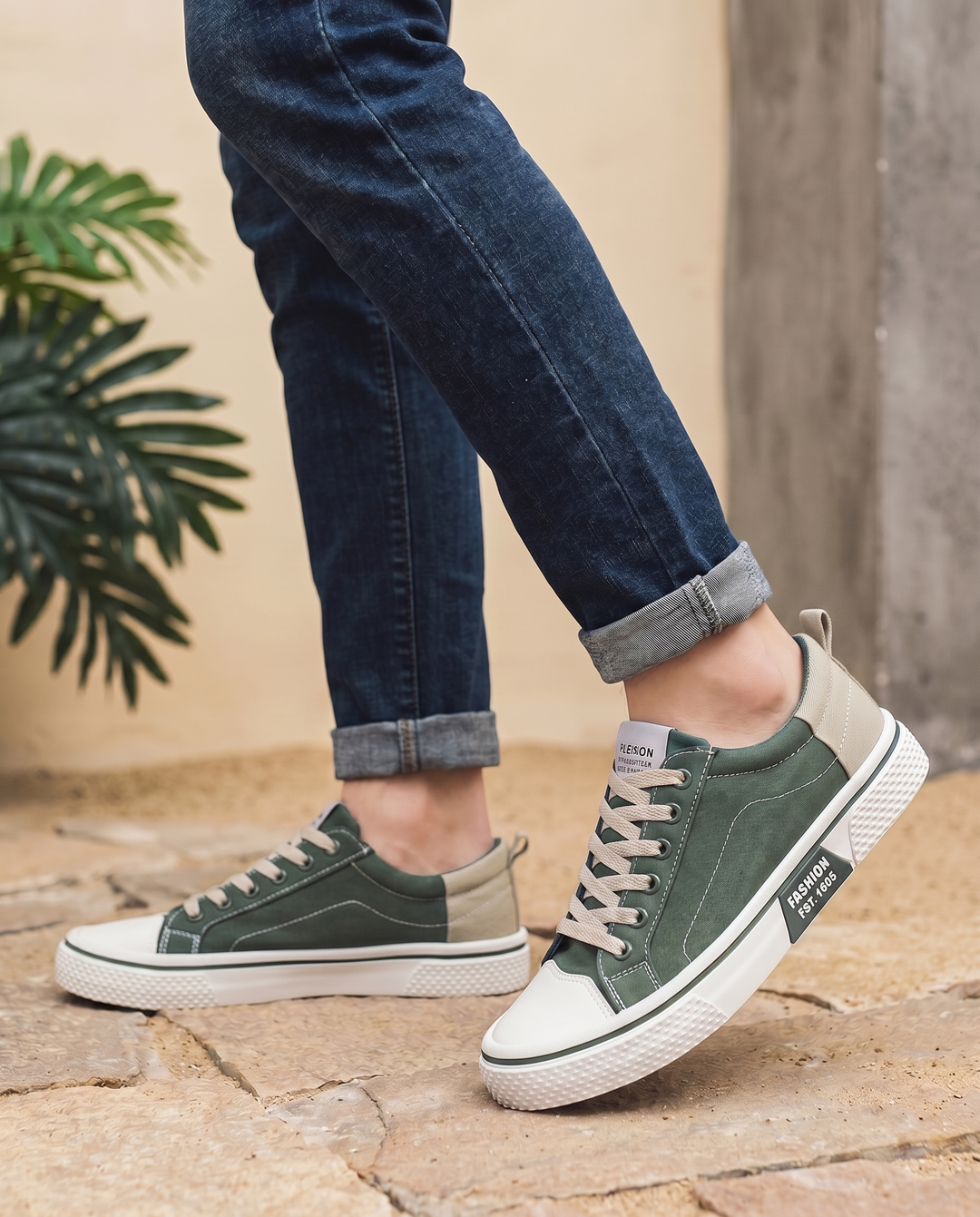 Milan trainers in green, worn walking — editorial lifestyle