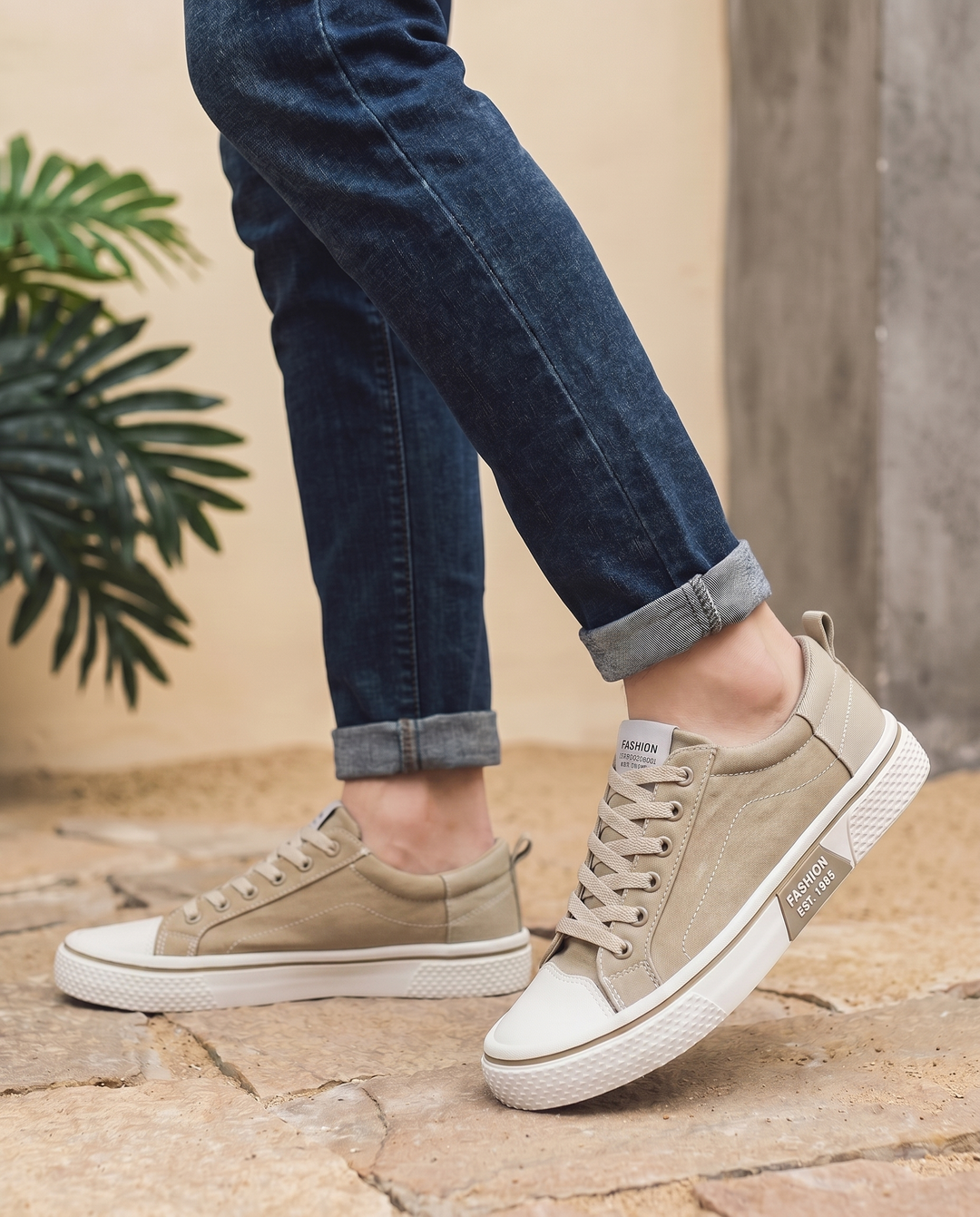 Milan trainers in beige, worn walking — editorial lifestyle