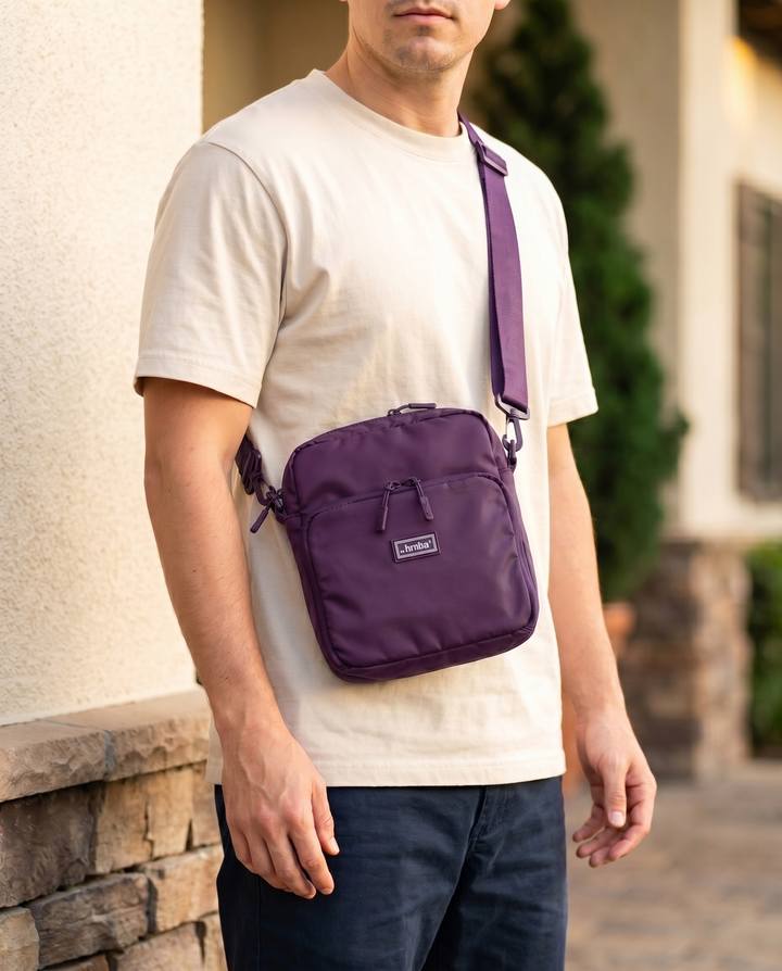 Foldable crossbody sling bag in Purple, worn