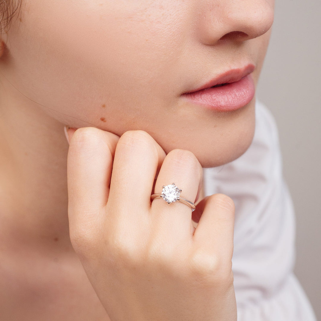 Woman wearing Eterna moissanite engagement ring